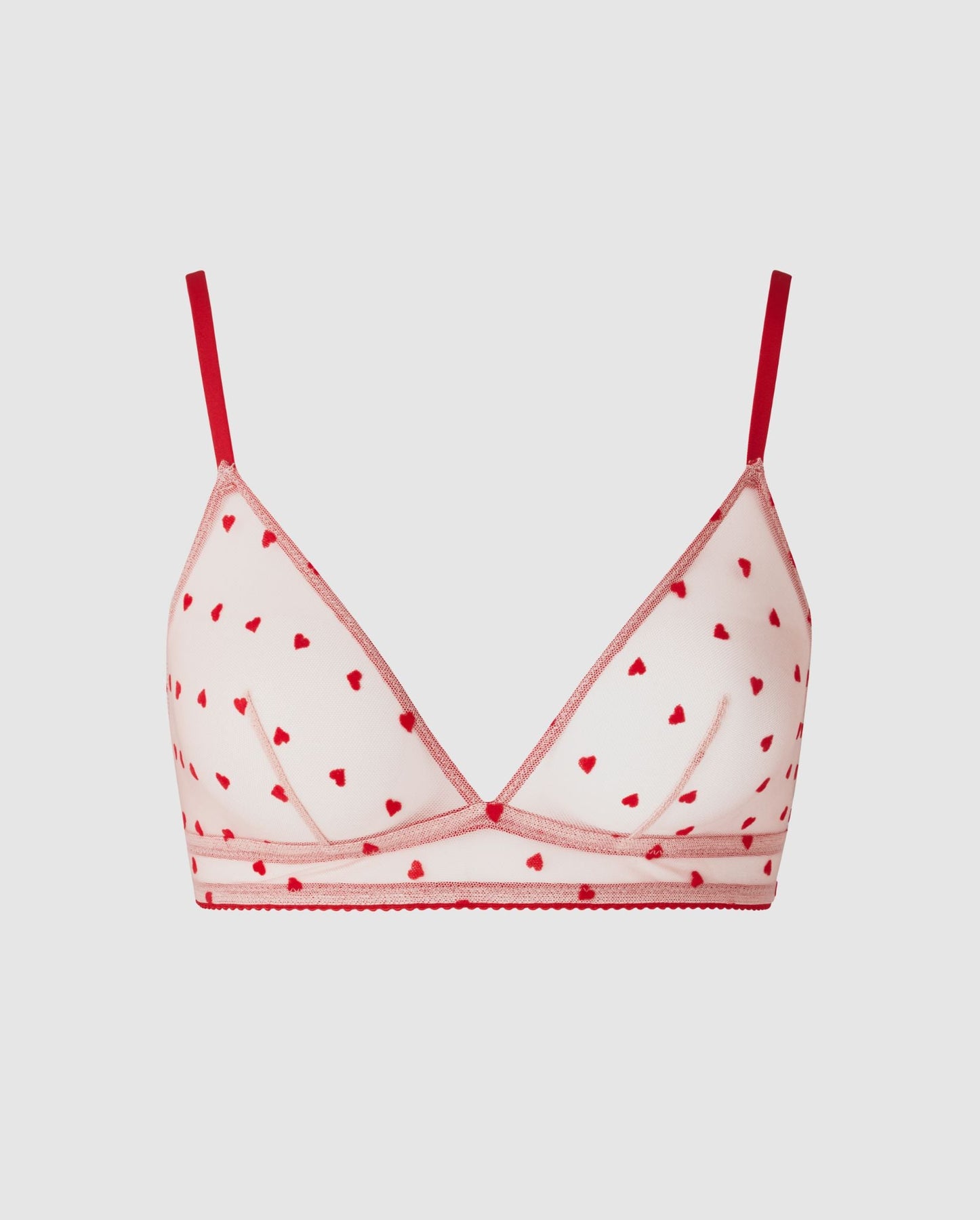 Red triangle bra with white polka dots Agnès B. x Dim